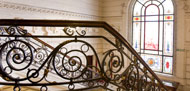 Barandilla de volutas-hierro-bronce forjs